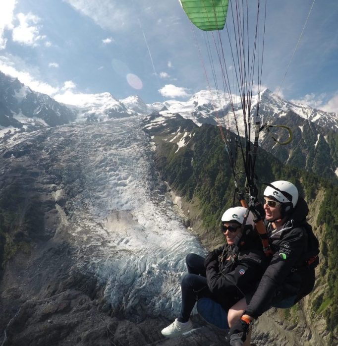 Tandem paragliding in front of the Bossons Glacier in Chamonix